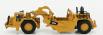 Dm-models Caterpillar Cat657g Ruspa Gommata - kolesový traktor so škrabákom 1:125 žltá čierna