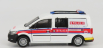 Drobné hračky Volkswagen Caddy Van Police 2020 1:64 bielo-červená