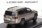 LCD model Toyota Land Cruiser Lc300-gr Sport 2022 1:64 Zlatý