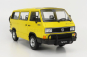 Volkswagen T3 Minibus Syncro 1987 v mierke 1:18 žltá