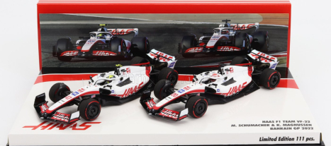 Minichamps Haas F1 Set 2x Vf-22 Ferrari Team Haas N 20 5th Bahrain GP 2022 Kevin Magnussen + N 47 Bahrain GP 2022 Mick Schumacher 1:43 Biela čierna červená