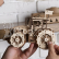 Ugears 3D drevené mechanické puzzle Traktor vyhráva