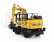 Universal hobbies Komatsu Pw180 Escavatore Gommato - Traktor Bagr 1:50 žltá čierna