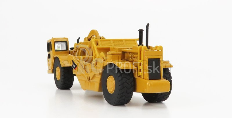 Dm-models Caterpillar Cat627g Ruspa Gommata - kolesový traktor so škrabákom 1:87 žltá čierna