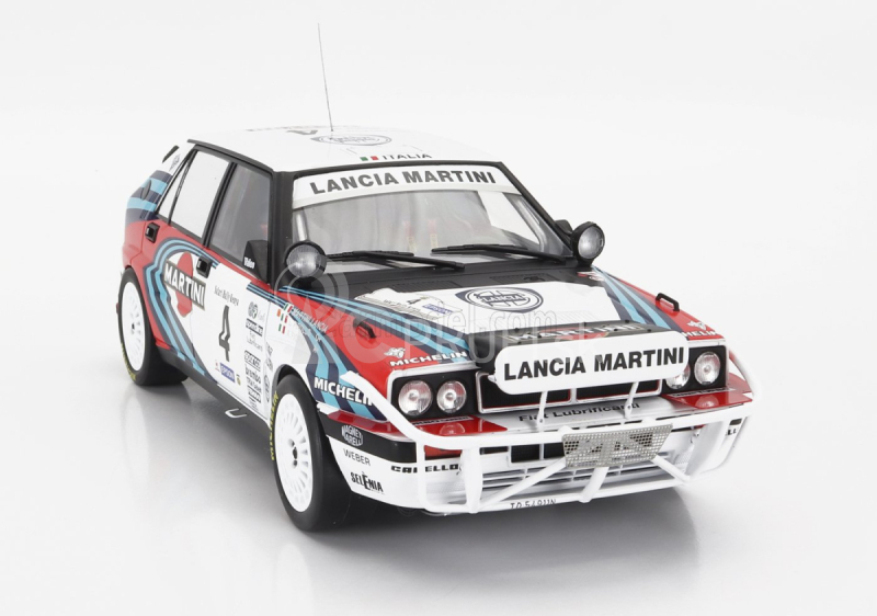 Ixo-models Lancia Delta Integrale 16v Martini (nočná verzia) N 4 Rally Safari 1990 Alessandro Fiorio - Luigi Pirollo 1:18 Biela modrá červená