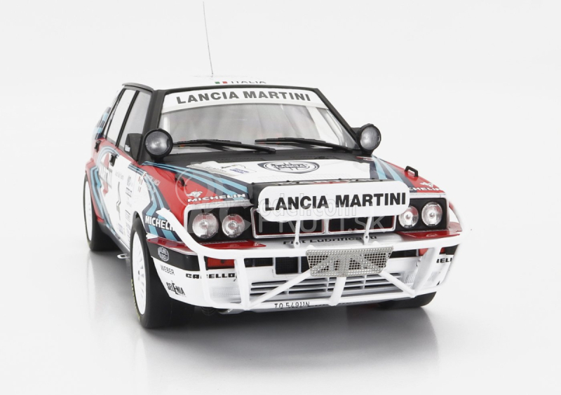 Ixo-models Lancia Delta Integrale 16v Martini (nočná verzia) N 4 Rally Safari 1990 Alessandro Fiorio - Luigi Pirollo 1:18 Biela modrá červená