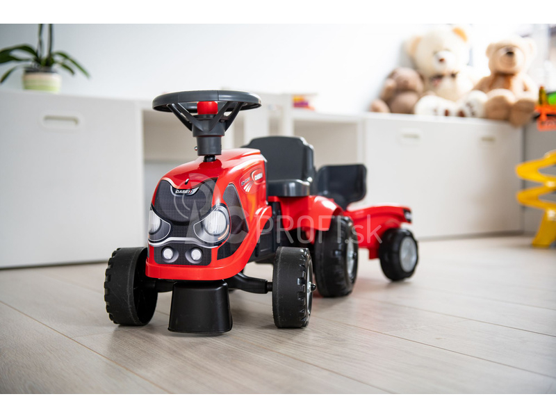 FALK – Detské odrážadlo Baby Case IH s vlečkou, lopatkou a hrabličkami